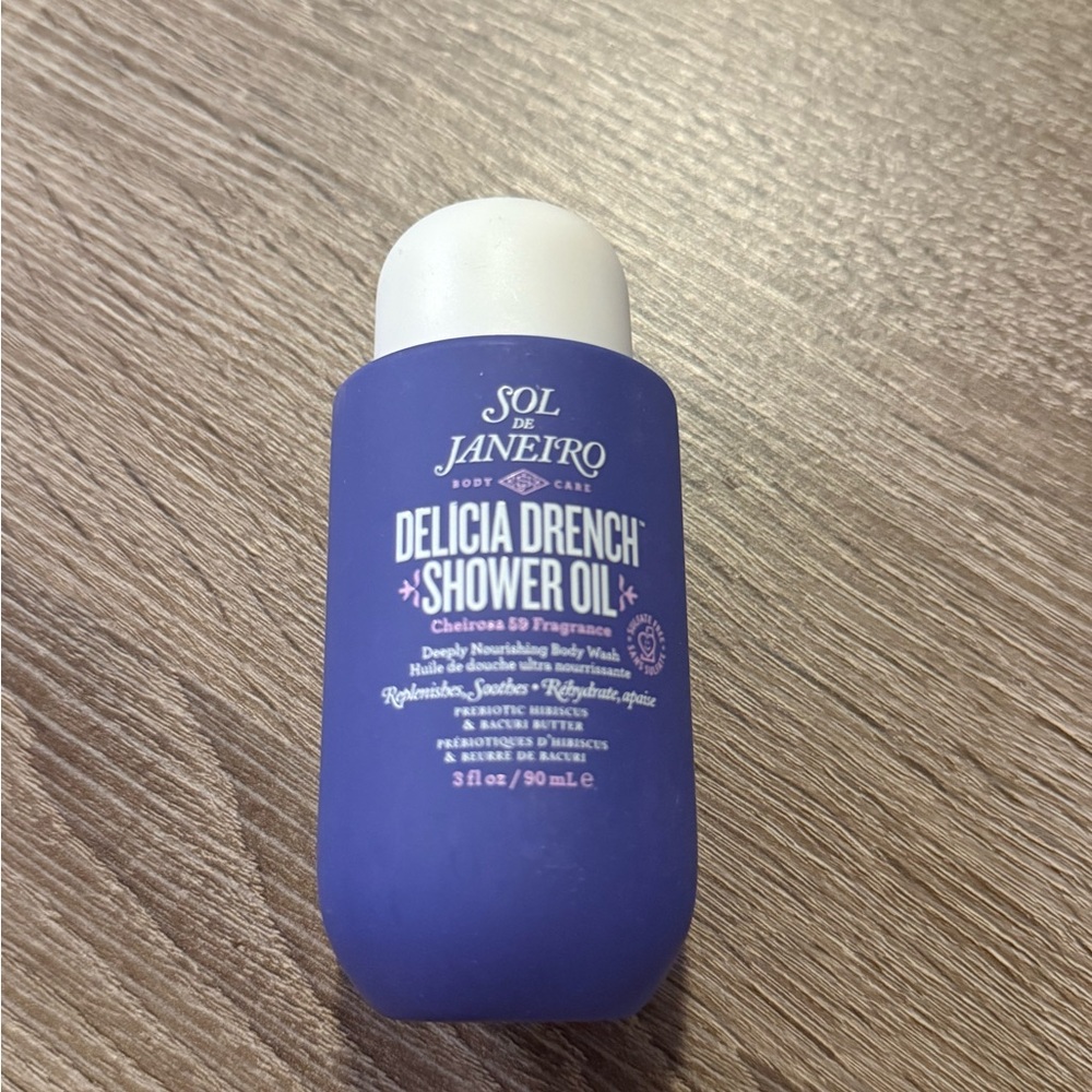 Sol de Janeiro Delicia Drench Shower Oil in Purple Bottle
